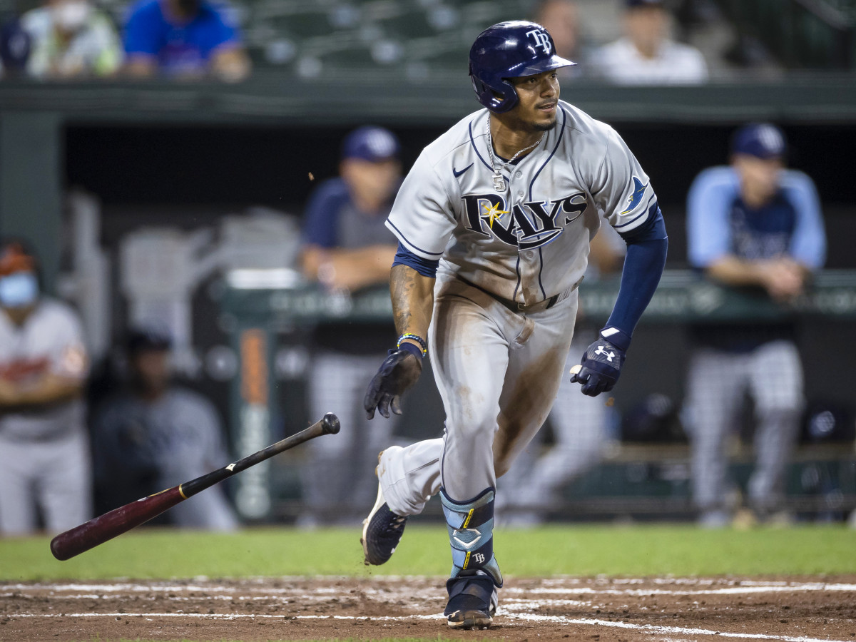 Aug 27, 2021; Baltimore, Maryland, USA; Tampa Bay Rays shortstop Wander Franco (5) at bat against the Baltimore Orioles during the third inning at Oriole Park at Camden Yards.